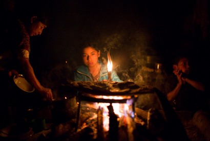 A Guatemalan family prepares to eat dinner. Bread for the World. 