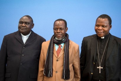 From left to right, Pastor Nicolas Guerekoyame Gbangou, Imam Oumar Kobine Layama, and Archbishop Dieudonne Nzapalainga. AFP Photo/Johannes Eisele.