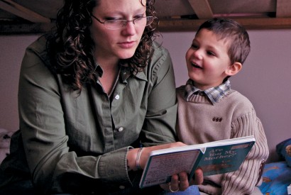 Heather Rude-Turner, reading to her son Isaac, depends on EITC (earned income tax credit) to help support her family. Laura Elizabeth Pohl/Bread for the World. 