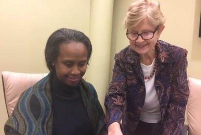 Ronnie Fellerath-Lowell, right, collaborating with partners at Catholic Relief Services. Photo courtesy of Ronnie Fellerath-Lowell.