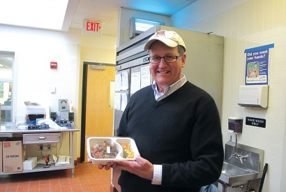 David Waters, CEO of Community Servings, displays one of the medically tailored meals prepared and delivered by the organization to chronically ill clients. Todd Post/Bread for the World.