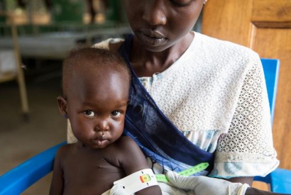 Afra, held by her mother Therese, is being checked for malnourishment at Al Sabbah Children's hospital in Juba, South Sudan. ©UNICEF/UN0232174/Njiokiktjien VII Photo