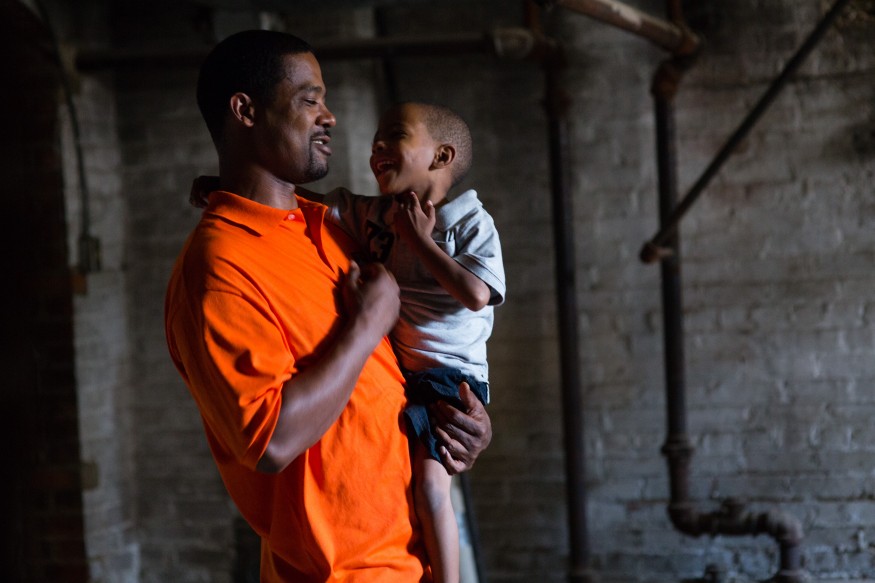 Dominic Duren spends a few moments with his son Dominc. Dominic is the director of the HELP Program in Cinncinati, Ohio. Joseph Molieri / Bread for the World